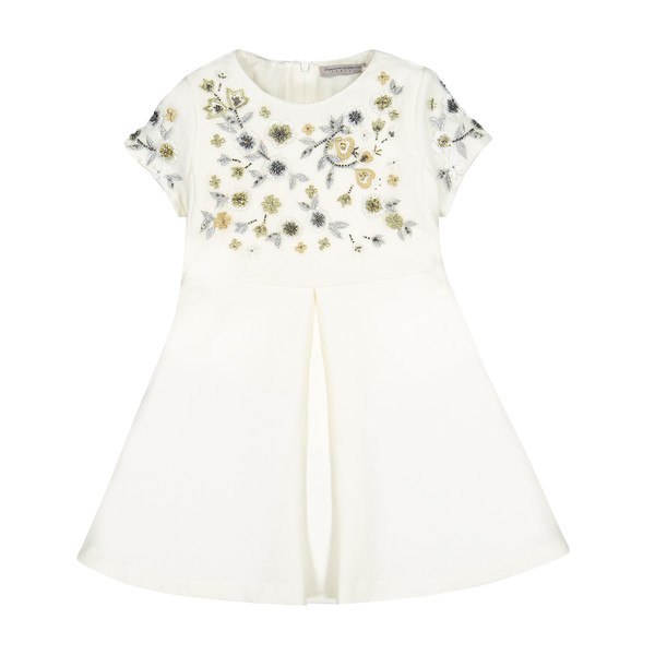 white dress with embroidered flowers