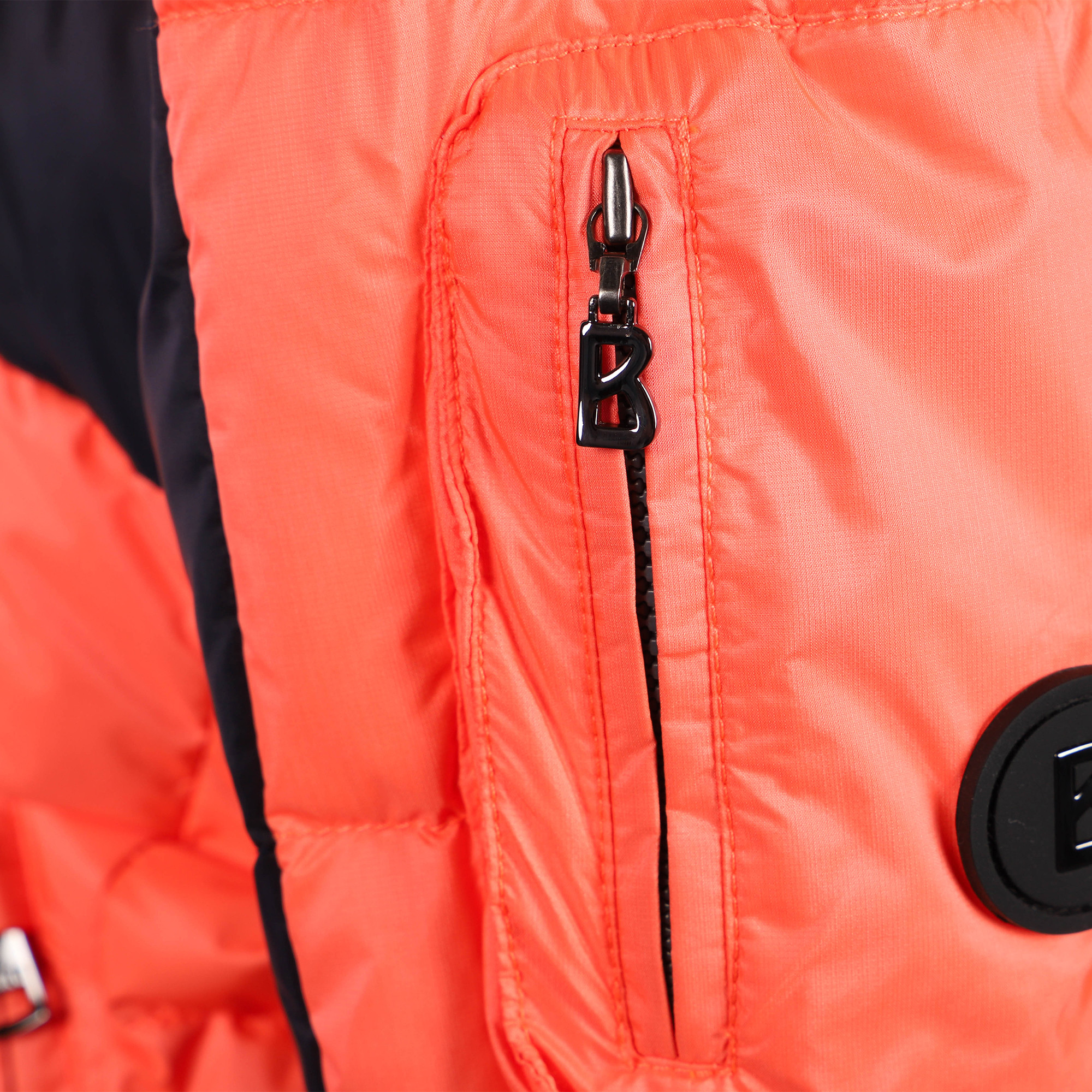 orange and black ski jacket